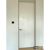 White Glossy Finish Travertini Concealed Doors UAE for Modern Interiors